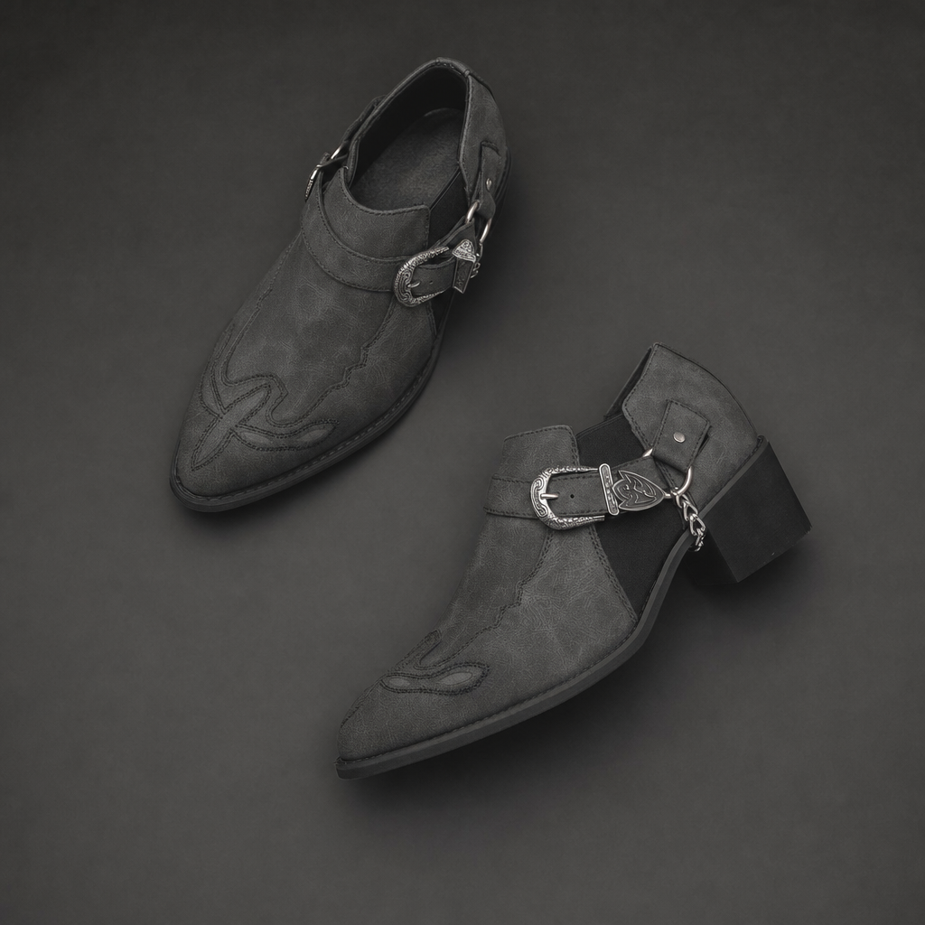 Brown suede pointed-toe boots with Western buckle