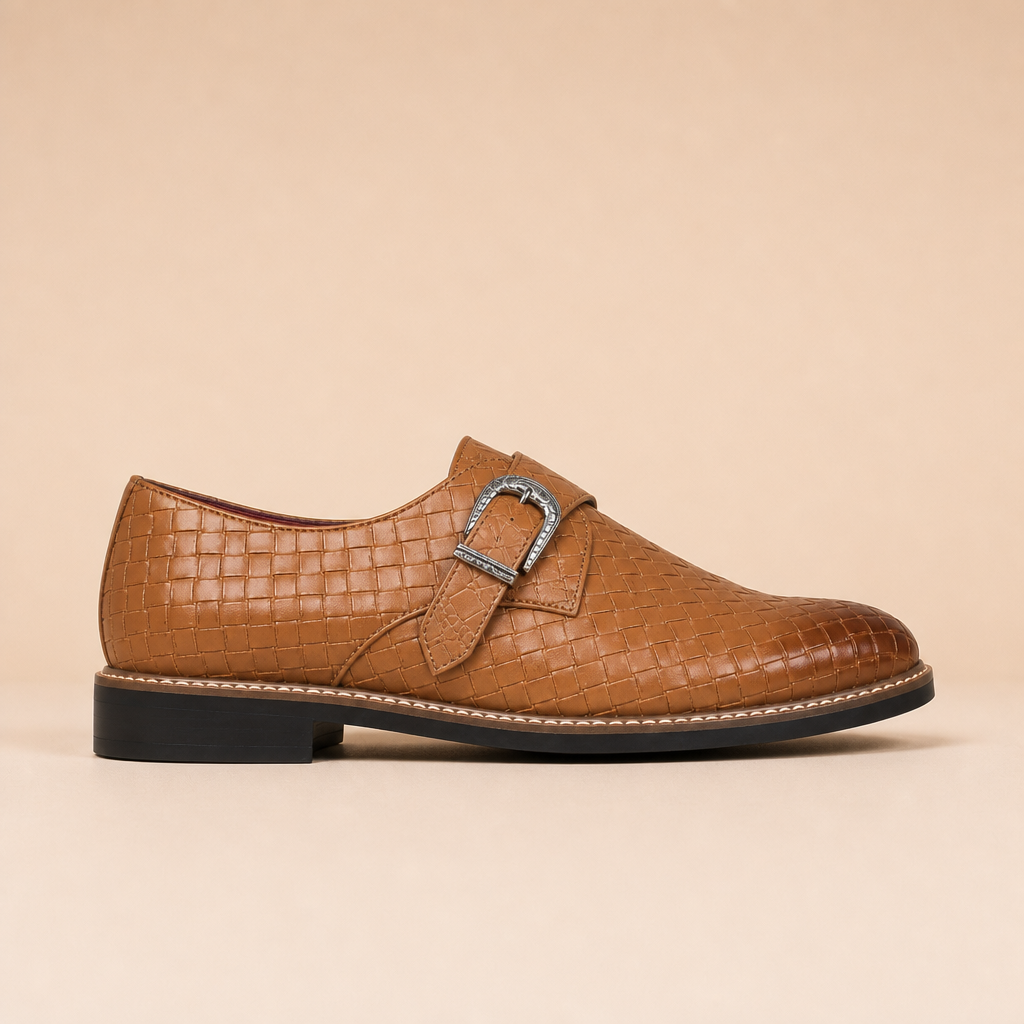 Side view of brown leather pointed-toe loafers